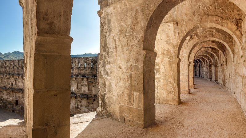 Top passageway in the theatre of Aspendos including arcade and a view of amphitheater