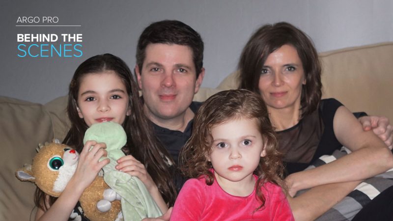 Argo Pro employee David Dineen posing on the couch with his wife and two daughters