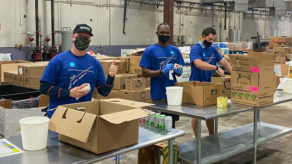 Argo Surety employees volunteering at Houston food bank